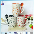 green red orange and blue coffee mug with spoon for your drinks